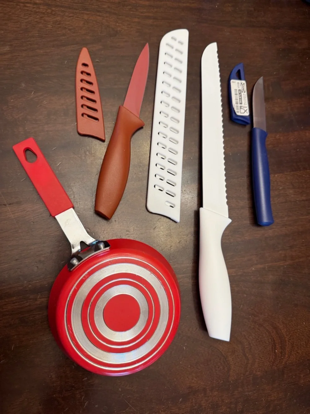 Assorted Kitchen Knife and Utensil Set with Red-Handled Mini Skillet